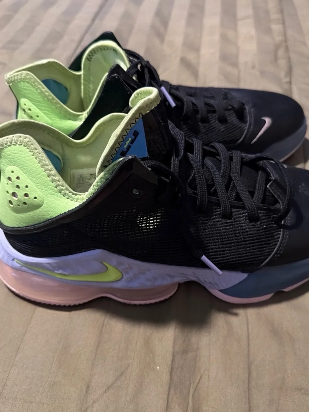 Nike Black Sneakers with Lime Green and Light Blue Accents